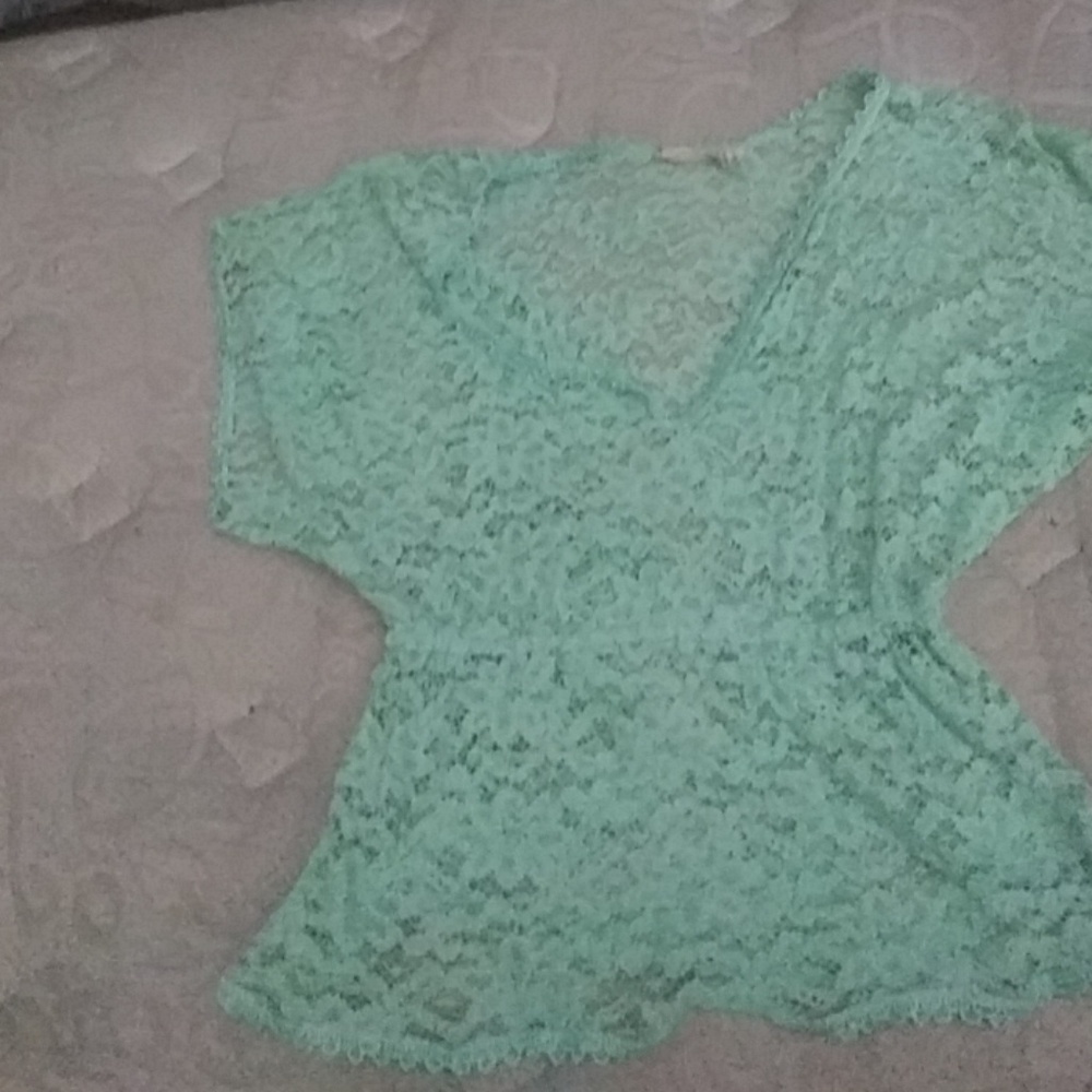 A mint green top